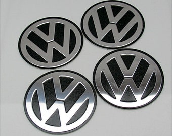 4x adesivi per coprimozzo ruota VW VOLKSWAGEN 56,5/60/65/70mm cromati, venditore nel Regno Unito