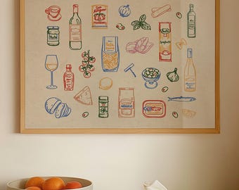 May include: A kitchen scene features a framed print with colorful illustrations of food items. A bowl of oranges, a cutting board, and a white cloth are on the wooden countertop. A stainless steel range hood and white tile backsplash are visible.