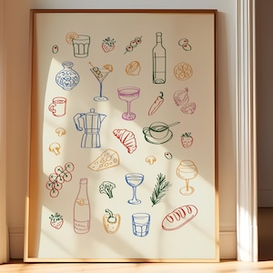 May include: A framed print featuring colorful line drawings of food and drink items. The illustrations include a cocktail, wine bottle, coffee cup, croissant, and various fruits and vegetables. The artwork is displayed on a light-colored background.
