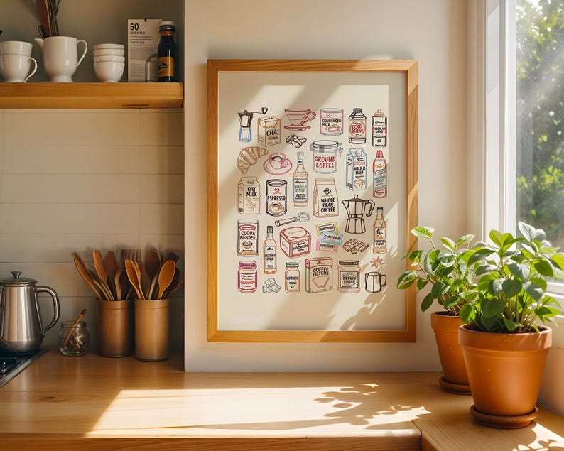 May include: A framed wall art print featuring a collection of illustrated coffee and cafe items, including a moka pot, coffee beans, milk cartons, syrup bottles, sugar packets, and various coffee-related ingredients in a colorful, line-art style.