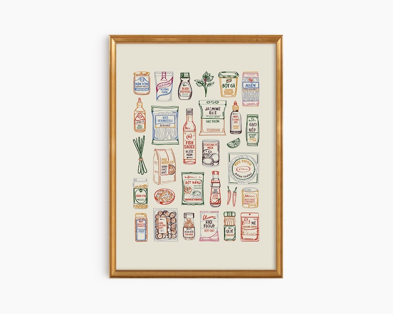 May include: A framed print featuring a colorful illustration of various Asian food ingredients. The artwork includes jars, bottles, and packages of items like fish sauce, rice, and spices, all with detailed labels and a vintage aesthetic.