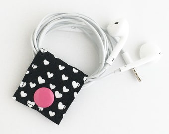 Heart shaped cord keeper