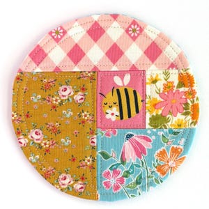 Patchwork Fabric Coaster: Colorful fabric mug rug for desk decor or housewarming gift.