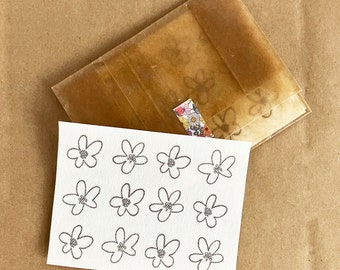 Flower Stick and Stitch Patterns: (2) small sheets of water soluble adhesive paper with 1" flowers.