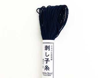 Navy Blue Cotton Sashiko Thread: Dark blue hand sewing thread for visible mending or embroidery.