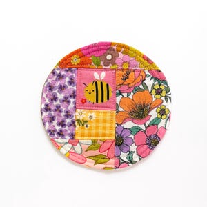 Bee Patchwork Coaster: Colorful fabric mug rug for desk decor or housewarming gift.