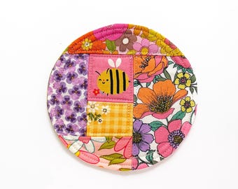 Bee Patchwork Coaster: Colorful fabric mug rug for desk decor or housewarming gift.