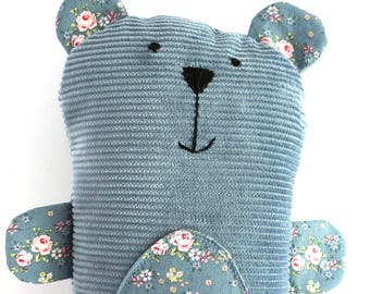 Blue Teddy Bear: Stuffed toy bear made from corduroy and floral cotton fabric.