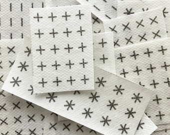 Visible Mending Stick and Stitch Patterns: Sashiko patterns on water soluble adhesive paper.