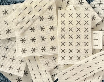 Visible Mending Stick and Stitch Patterns: Sashiko patterns on water soluble adhesive paper.
