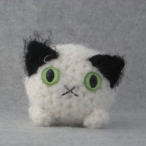 Black and white plush kitty