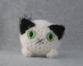 Black and white plush kitty