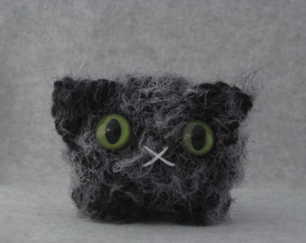 Crocheted charcoal grey plush kitty