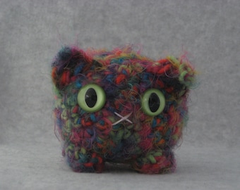 Crocheted rainbow plush kitty