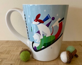 Mug Starbucks 2011 Holiday Christmas Boy and Dog on Sled Sledding Mug Coffee Cup 12 oz