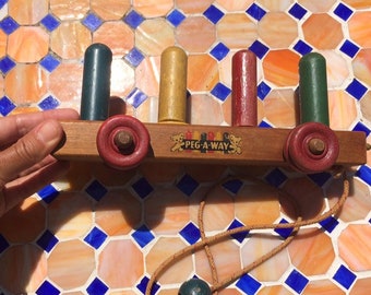 Vintage 1950s Wooden Peg-A-Way Pull Toy