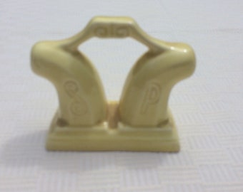 Mid century scrolled designs ceramic connected salt and pepper shaker