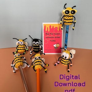 May include: A collection of handmade crochet bee pencil toppers in yellow and black, with white wings and black antennae. One bee wears sunglasses. A card reads "Bee the reason someone smiles today." Text at the bottom says "Digital Download pdf."
