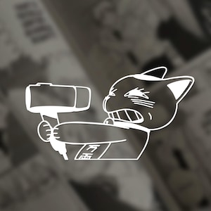 May include: White line art sticker of a cat holding a hammer. The cat has an angry expression with its teeth bared. The sticker has Japanese text on the cat's shirt. The background is blurred.