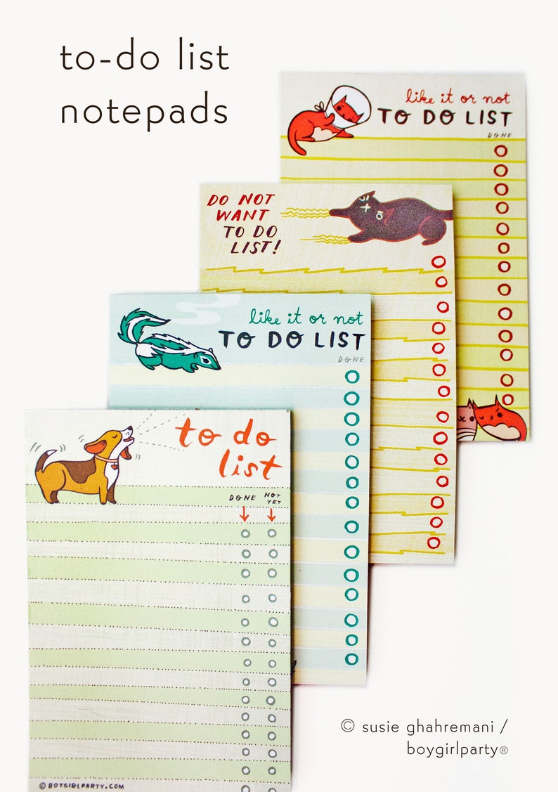 May include: Four colorful to-do list notepads with animal illustrations. The notepads have a yellow, blue, green, and white background with black and red lines. The notepads have the text "to do list" and "like it or not" on them. The notepads have a variety of animals on them, including a cat, a dog, a skunk, and a fox.