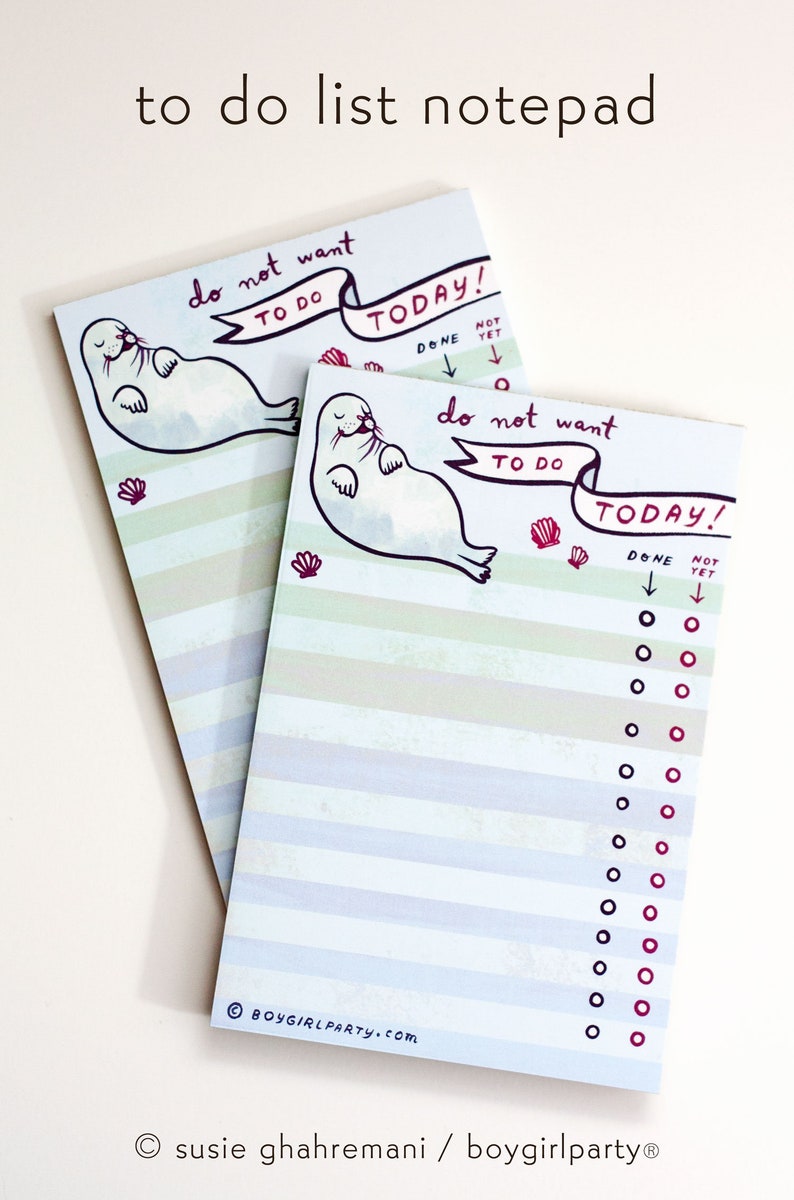 May include: Two notepads with a whimsical design. Each notepad features a cartoon seal, the text "do not want to do today!", and a checklist. The notepads have a striped background in shades of blue and green.