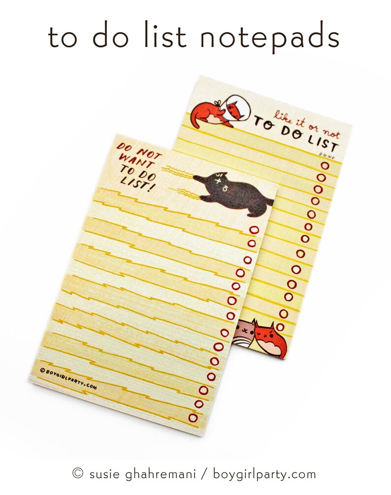 May include: Two yellow to-do list notepads with black and red cat illustrations. The notepad on the left has the text "Do Not Want To Do List!" and the notepad on the right has the text "Like it or not To Do List" with a check box labelled "Done".