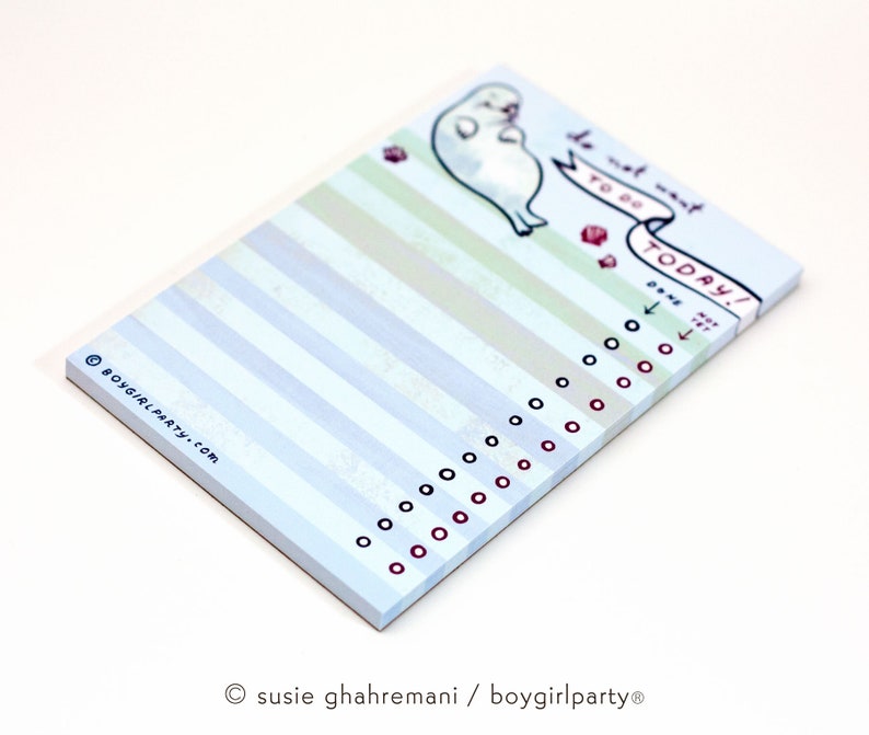 May include: A light blue notepad with vertical stripes and a cartoon seal illustration. The notepad has the text "do not want to do TODAY!" and a list of circles for check marks. The bottom left corner has the text "BOYGIRLPARTY.COM".