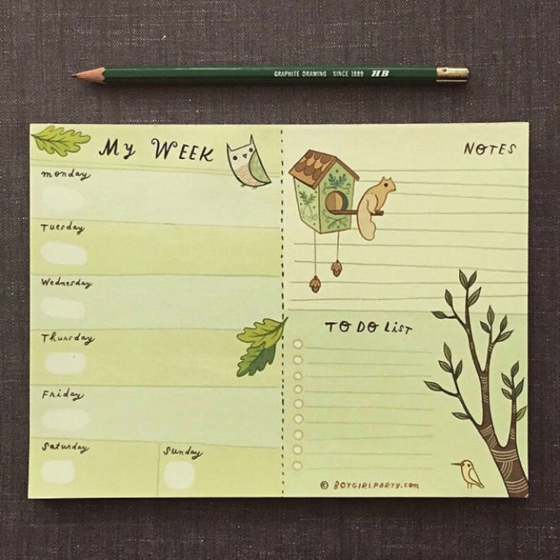 May include: A green and yellow weekly planner with a to-do list, notes section, and illustrations of an owl, squirrel, and birdhouse. The planner has the text "My Week" at the top.