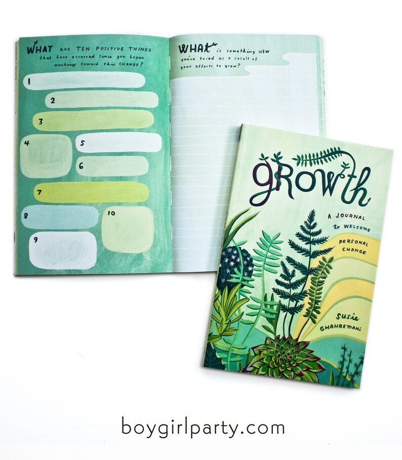 May include: A green journal with the word "growth" in a stylized font. The cover features a colorful illustration of plants and ferns. The journal is titled "A Journal to Welcome Personal Change" and is by Susie Ghahremani.