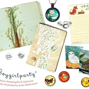 May include: A collection of nature-themed stationery and gifts, including a notebook with a tree illustration, a to-do list notepad with a fox illustration, and a variety of charm pendants featuring animals like owls, butterflies, and hummingbirds. The text "Boygirlparty" and "Nature themed gifts & stationery uniquely illustrated by Susie Ghahremani" is visible on the image.