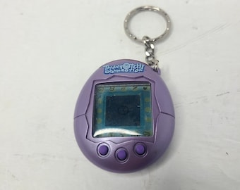 2004 Tamagotchi Connection V2 Original Green With Flowers - N2390