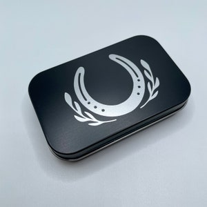 Lucky horseshoe tin