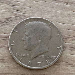 United States half dollar 1972 , Kennedy Half Dollar coin, a clad coin pure copper core/outer layer of copper nickel