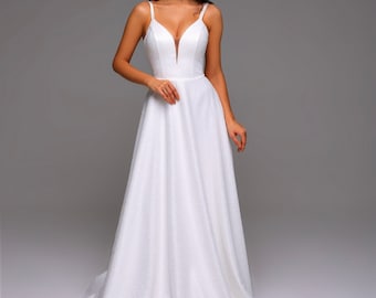Robe corset trapèze, jupe duveteuse, revêtement scintillant
