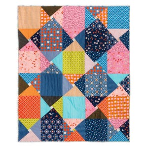 May include: A colorful patchwork quilt with a geometric pattern of squares and triangles. The quilt is made with a variety of fabrics in shades of blue, pink, orange, green, and yellow.