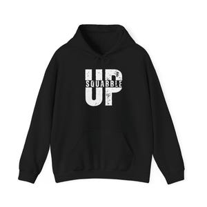 May include: Black hooded sweatshirt with a white graphic that says "SQUABBLE UP" in a distressed font.