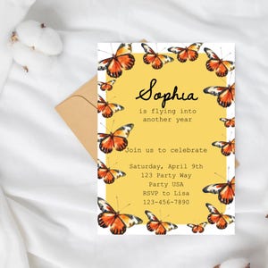 May include: A yellow invitation card with butterfly illustrations. The card features the name "Sophia" and event details: "is flying into another year", date, address, and RSVP information. The butterflies are orange and black.