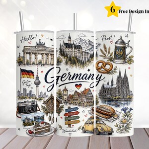Könnte beinhalten: Ein weißer zylindrischer Becher mit einer Rundum-Grafik deutscher Wahrzeichen wie dem Brandenburger Tor, dem Kölner Dom und Schloss Neuschwanstein sowie Illustrationen eines Bierkrugs, einer Brezel, einer Wurst und eines gelben Autos.
