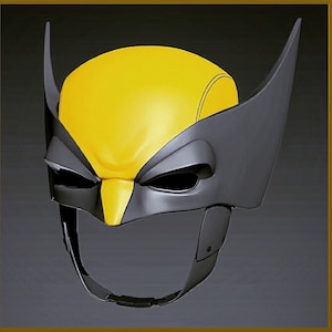 May include: A yellow and black plastic mask with a raised design. The mask has a pointed nose and eye holes. The mask is designed to look like a superhero.