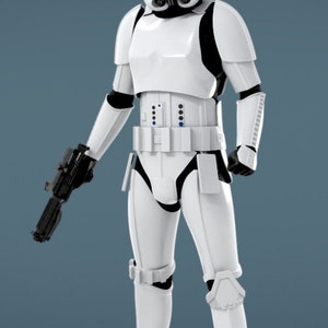 Può includere: Una action figure di Stormtrooper bianca con un fucile blaster nero. La figura indossa un elmetto bianco con una visiera nera e una tuta bianca e nera.