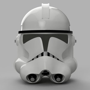 May include: A white plastic clone trooper helmet with a black visor and a black stripe across the top. The helmet has a detailed design with a raised ridge on the top and a series of ridges on the front.
