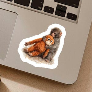 Viral Punch Monkey Bravery Sticker, Punch is a baby Japanese Macaque living in the ickikawa city zoo in Japan who went viral for clinging to a stuffed orangutan toy for comfort because he was abandoned by his mother