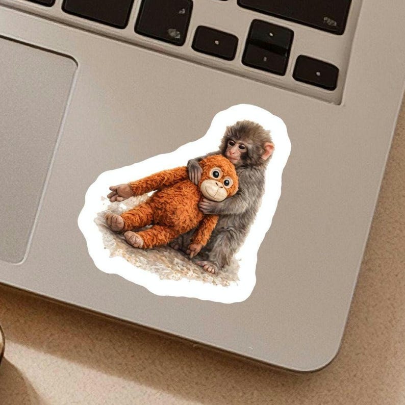 Viral Punch Monkey Bravery Sticker, Punch is a baby Japanese Macaque living in the ickikawa city zoo in Japan who went viral for clinging to a stuffed orangutan toy for comfort because he was abandoned by his mother