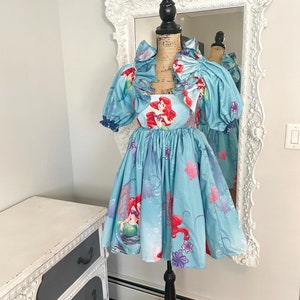 New York Couture *One of a Kind* PART Of THIS WORLD Print Dreamy Ruffle Trim Puff Sleeve Dress