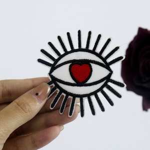 evil eye patch, red heart in eye patch, iron on patch, embroidered patch, applique, iron on clothing labels,