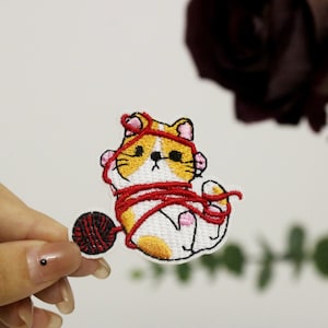 orange cat playing wool ball patch, iron on patch, embroidered patch, applique, iron on clothing labels,