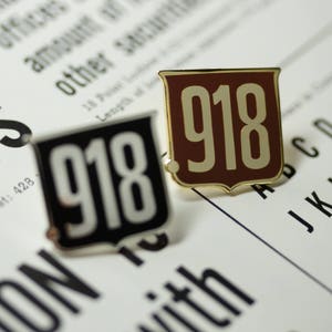 Letterpress Type High .918 Badge Enamel Pin in Gold and Rust Red