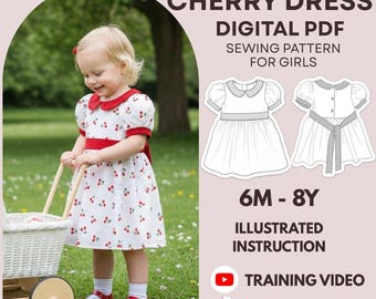 May include: A young child wearing a white cherry-print dress with red trim and a matching bow. The dress is part of a digital PDF sewing pattern for girls, with illustrated instructions and a training video. The text on the image says "CHERRY DRESS".