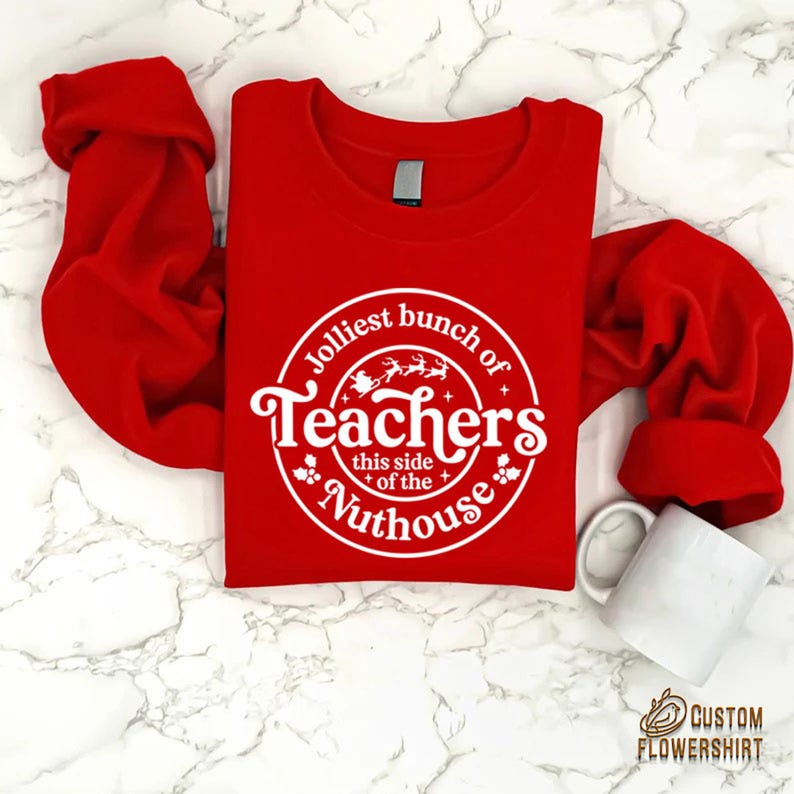 a red t - shirt with the words teachers on it