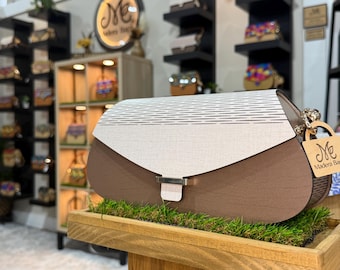 Introducing the Lisette Handbag. A Hand crafted, classically elegant handbag made from wood.
